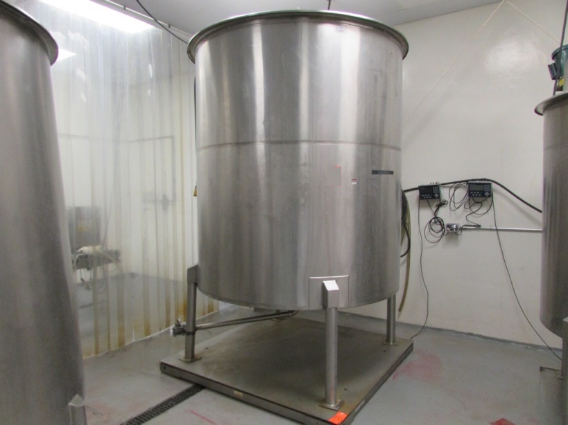 ***SOLD*** used 1500 Gallon Stainless Steel Sanitary Mix Tank. Cone Bottom Tank with (4) Stainless Steel Legs, Neptune JG-6.1 1/2HP Clamp On Mixer with Stainless Steel Shaft and Prop, 350 RPM output. 6'2